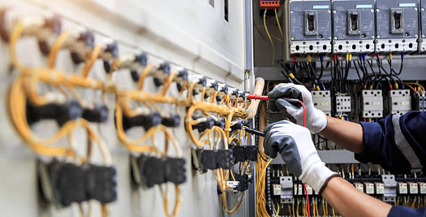 Professional Electrical Panel Upgrade technician working in Scott County County, IA